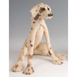 Kerry Jameson (b.1969) - a studio ceramic model of a seated dog, h.34cm Note: Purchased from the Pam