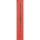 A large 20th century tribal spear having barbed end and incised decoration, length 256cm