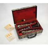 An early 20th century continental four piece clarinet, cased
