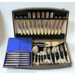 A 1930s oak cased six-place setting canteen of silver plated cutlery; together with a cased set of