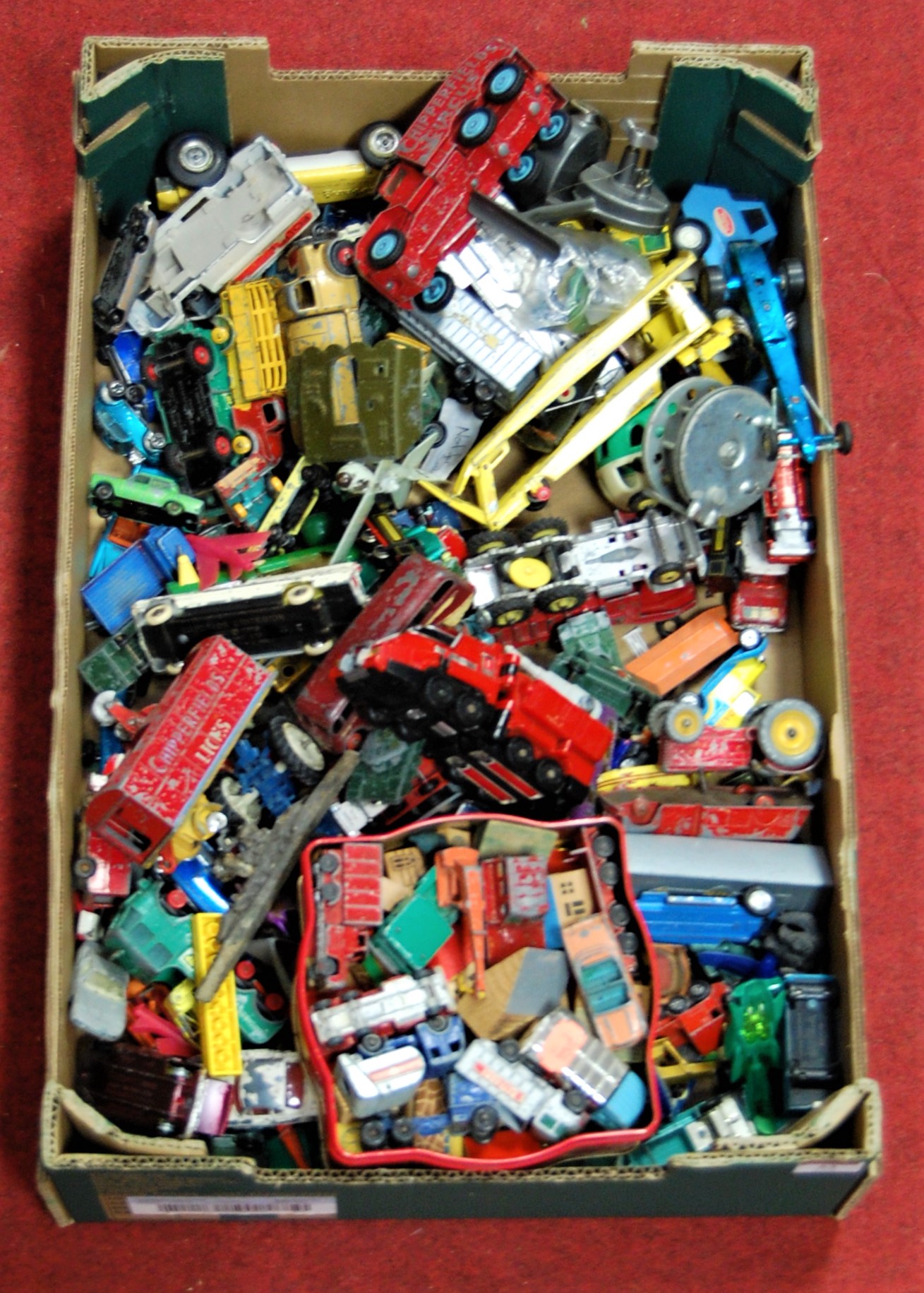 A large collection of loose and playworn diecast toy vehicles to include Dinky Toys Luxury Coach,