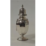 A George V silver pedestal lighthouse sugar sifter, having pierced cover and fluted body to circular