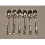 A set of six silver teaspoons in the Art Nouveau style, each having pierced entwined stem