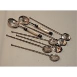 A set of six Spanish silver cocktail stirrers, each having leaf shaped bowl and plain stem; together