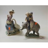 A Lladro porcelain figure of two children on the back of a baby elephant, having printed Lladro mark