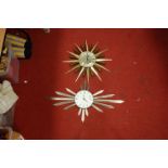 A modern Metamec sunburst wall clock having a quartz movement, together with one other similar