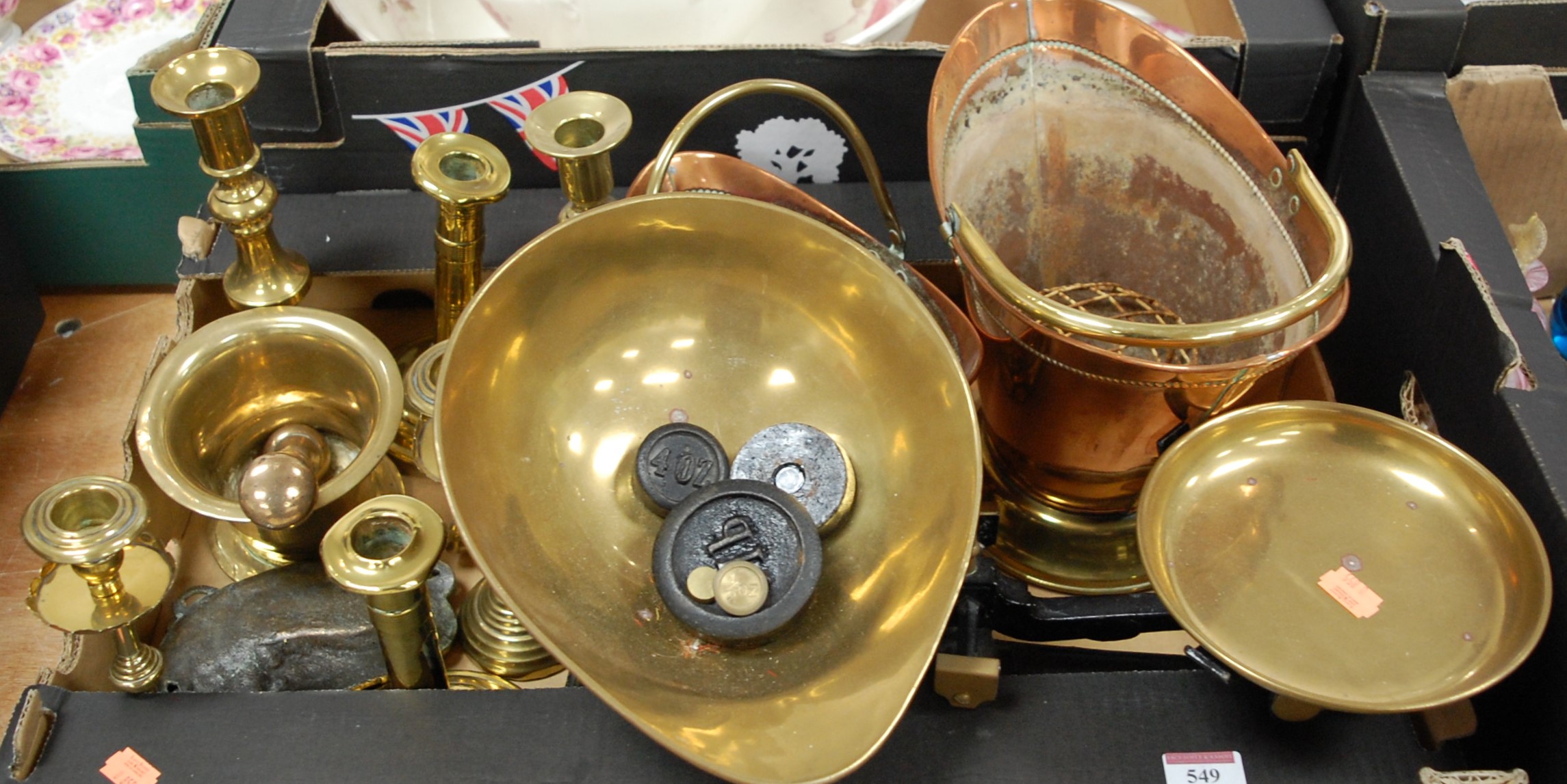 A collection of metalware, to include a brass pestle and mortar, copper and brass buckets etc