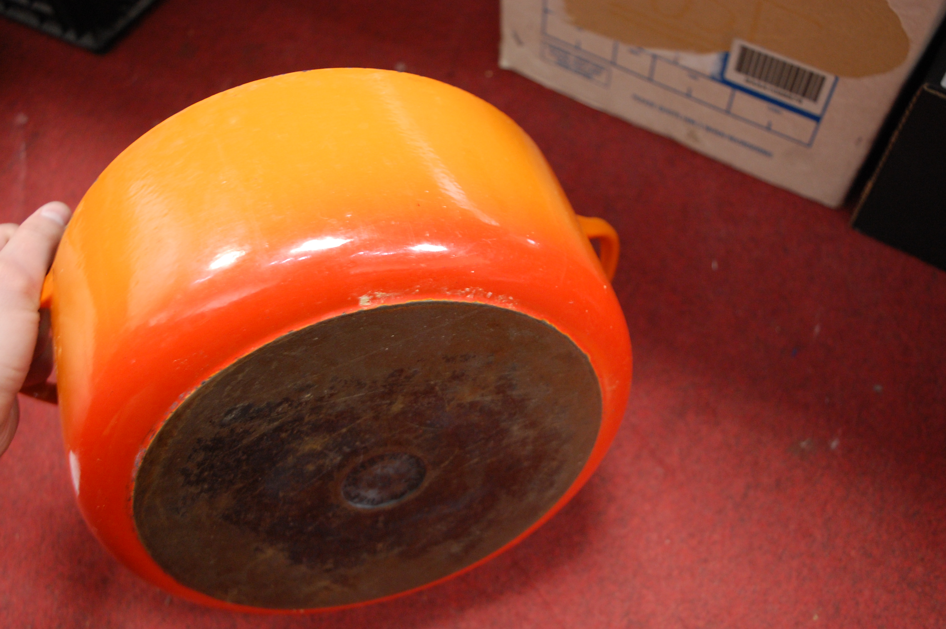 A Le Creuset orange enamelled casserole dish and cover together with one other smaller example (2) - Image 12 of 12