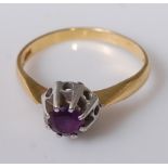 A modern 18ct gold and claw set amethyst dress ring, 2.8g, size K