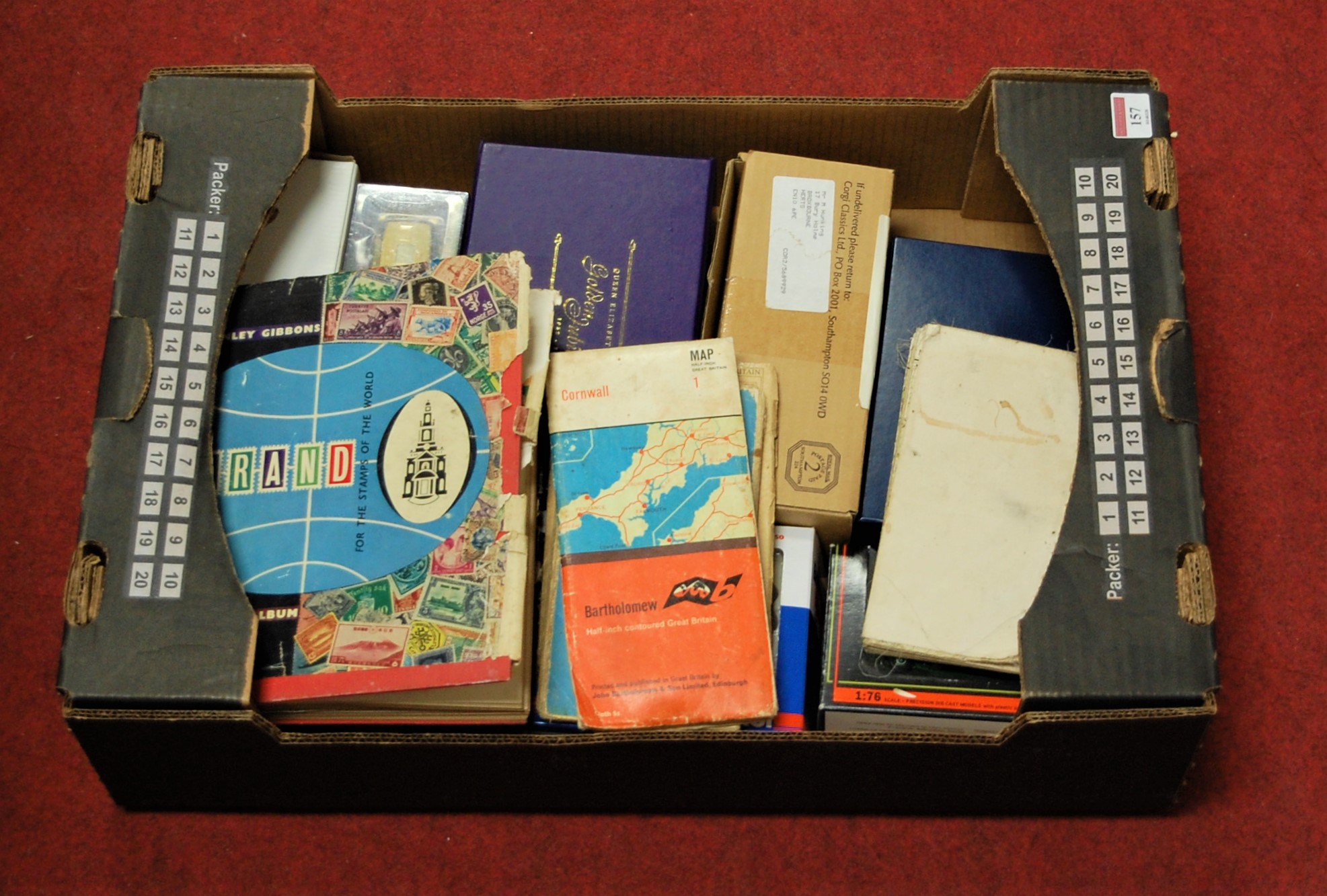 A box of miscellaneous items to include Strand stamp album and contents mainly being 20th century