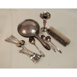 A collection of miscellaneous silver items, to include silver backed hand mirror, spill vase,