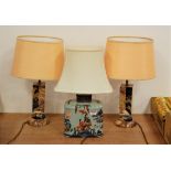 A pair of Art Deco veined marble square section table lamps each on circular domed footrim with