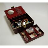 A leather clad jewellery box and contents to include Edward VII Coronation medal, silver dress ring,