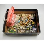 A box of miscellaneous modern costume jewellery to include varous bangles, hairclips, necklaces etc