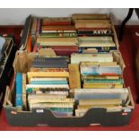 Two boxes containing a collection of books, mainly being 20th century literature