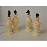 Two pairs of alabaster table lamps, height of largest 28cm including fittings