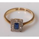 An Art Deco sapphire and diamond dress ring, the baguette cut blue sapphire (possibly synthetic)