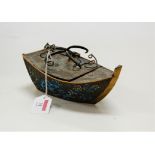 An early 20th century brass and cloisonne enamelled trinket box and cover in the form of a boat,