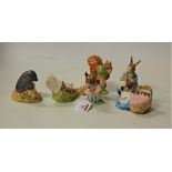 Three Beswick Beatrix Potter figures, comprising Hunca Munca, Mrs Tittlemouse, and Squirrel