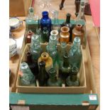 A collection of assorted glass and stoneware bottles to include Bloys & Sons, Sudbury, Suffolk, GW