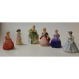 A collection of six Royal Douton figurines, comprising Fair Maiden HN211, Valerie HN2107, Marie