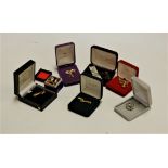 A small collection of assorted mainly modern costume jewellery to include yellow metal gem set