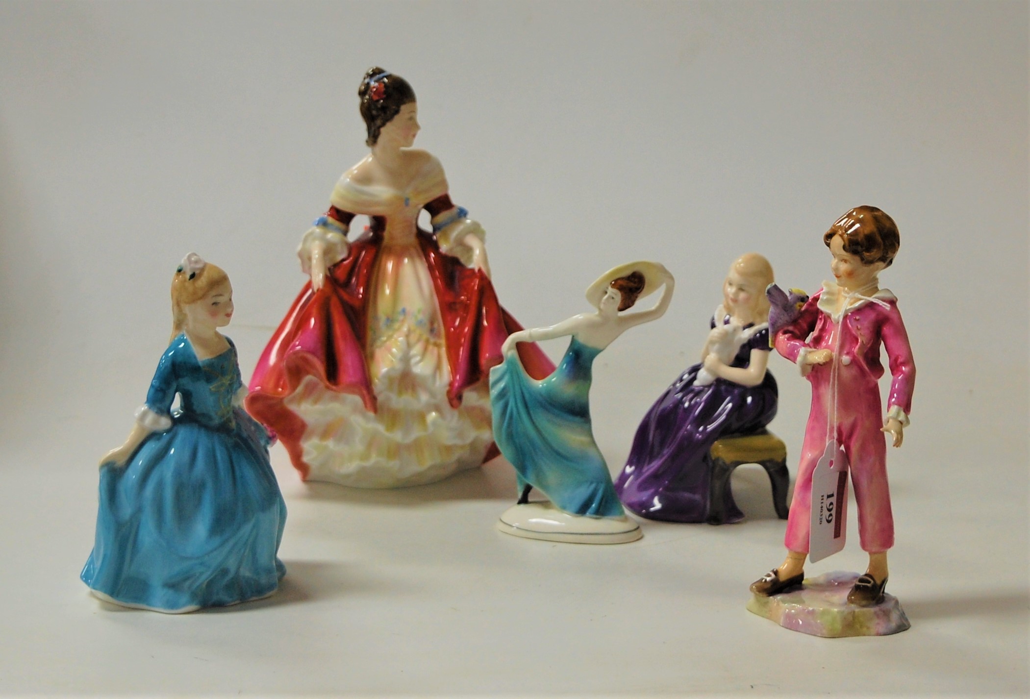 A collection of three Royal Doulton figurines, comprising Southern Belle HN2229, Affection HN2234,