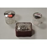 A George V red Moroccan leather clad trinket box and cover, of serpentine form, having silver