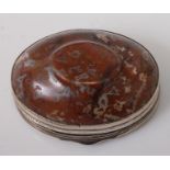 A George III white metal and moss agate snuff box, of oval form, the white metal mount to hinge