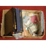 A box containing various first day covers, coins and stamps (mainly loose)