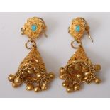 A pair of gilt metal and filigree worked turquoise set ear pendants, the pierced conical drops