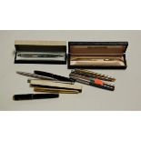 A collection of fountain and ballpoint pens to include Parker fountain pen with 14ct gold nib