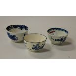 An 18th century Worcester blue and white tea bowl, decorated with various Oriental figures within