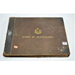 An early 20th century leather bound album, the cover bearing gilt tooled title 'Views of