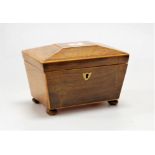 An early Victorian rosewood and boxwood strung tea caddy of sarcophagus form, having twin