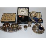 A box of miscellaneous items, to include silver plated coffee bean spoons, silver plated cruet, pair