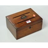 A Victorian mahogany ballot box of plain rectangular form, the hinged lid with two apertures,