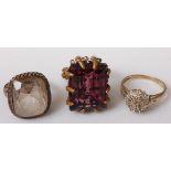 A gilt metal and amethyst set dress ring; together with a modern 9ct gold diamond point tiered