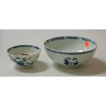 An 18th century Lowestoft porcelain bowl, the centre blue and white decorated with a flower, the