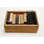 A large collection of boxed and loose photographic plates