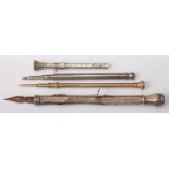 A silver and paste set propelling pencil; together with one other gilt metal and amethyst set