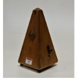 A mid 20th century French walnut cased metronome, height 22cm