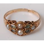 A Victorian 15ct gold, seed pearl and green peridot set ring, 2g, size P