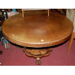 An early Victorian mahogany circular tilt-top pedestal breakfast table, dia.125cm