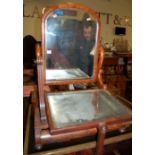 A large Victorian mahogany and flame mahogany swing dressing table mirror, with three drawer