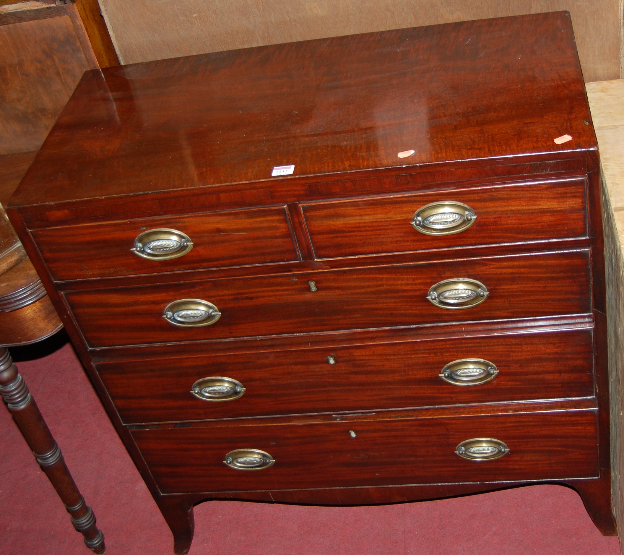 A 1920s oak gateleg occasional table on barley twist supports, together with a Stag Minstrel four