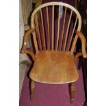 A 19th century elm, fruitwood and beech stickback elbow chair, width 50.5cm
