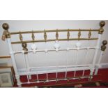 A Victorian cast iron, brass and white painted double bedstead, with side rails