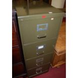 A 1950s military green painted steel four drawer office filing cabinet by Howden , width 46cm