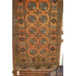 A Persian woollen rust ground Bokhara hall runner, 270 x 82cm
